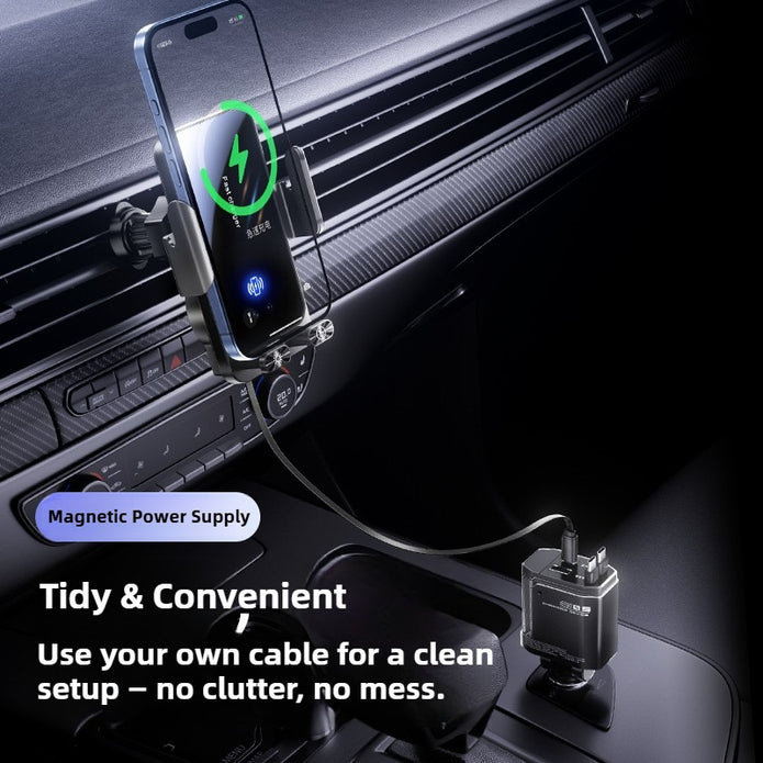 Car dashboard with magnetic power supply and phone holder, featuring a cable for charging.