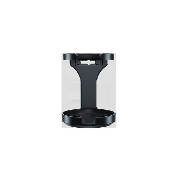 Black pet feeder in clear packaging on a white background