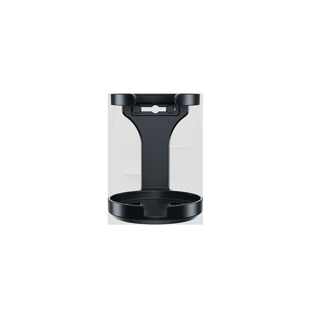 Black pet feeder in clear packaging on a white background