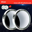 Two silver circular mirrors with 3M adhesive pads on a dark background