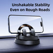 Phone holder on a car dashboard with text 'Unshakable Stability Even on Rough Roads' on a blue background