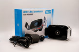 Wireless charger car holder with packaging and cable on a white background