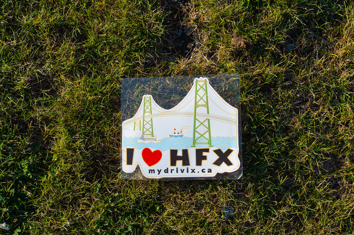 Sticker with 'I ❤️ HFX' text on a grassy background