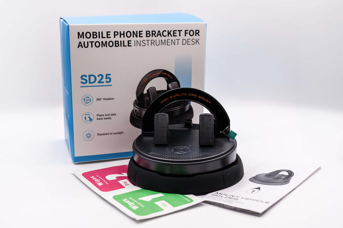 Mobile phone bracket for automobile instrument desk with packaging and accessories on a white background