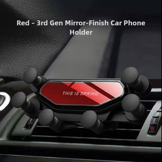 Car phone holder with red finish and 'This is Spring' text on a car dashboard.