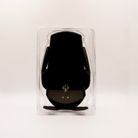 Black electronic device in clear packaging on a white background