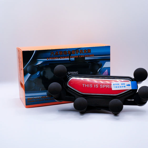 Car suspension spring with packaging on a light gray background