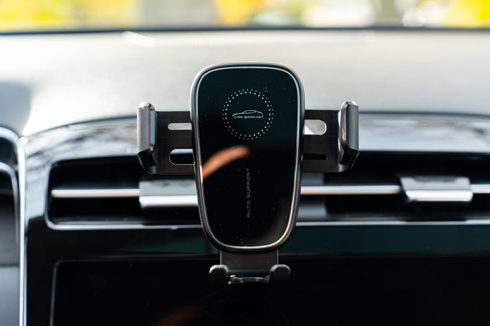 Car phone holder mounted on a car's dashboard