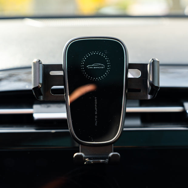 Car phone holder mounted on a car's dashboard