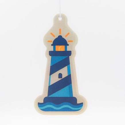 Decorative lighthouse air freshener on a white background