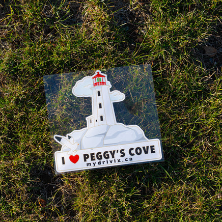 Sticker of a lighthouse with 'I ❤️ Peggy's Cove' text on grass